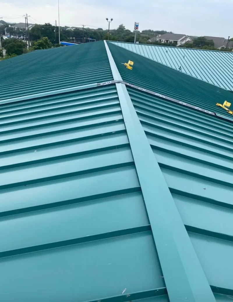Green commercial metal roof ridge and valley for Metal Roof Repair in Warsaw